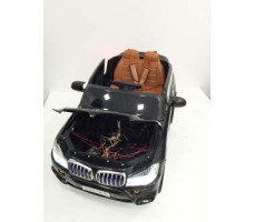 фото Детский электромобиль RiverToys BMW Е002КХ Black