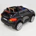 фото детского электромобиля RiverToys Porsche E008KX Black сзади