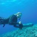 фото девушки с подводным буксировщиком Bonex AquaProp в воде